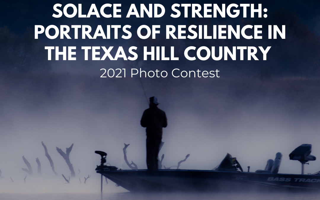 Man standing in a fishing boat - click to learn more about the 2021 Hill Country Photo Contest - "Solace and Strength: Portraits of Resilience in the Texas Hill Country"