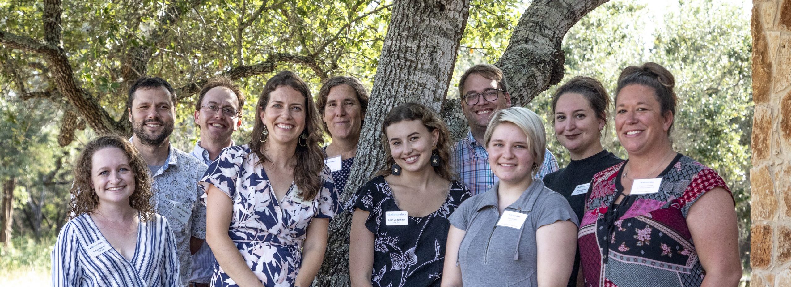 The Hill Country Alliance Staff pose for a photo under a live oak at the 2021 Hill Country Leadership Summit