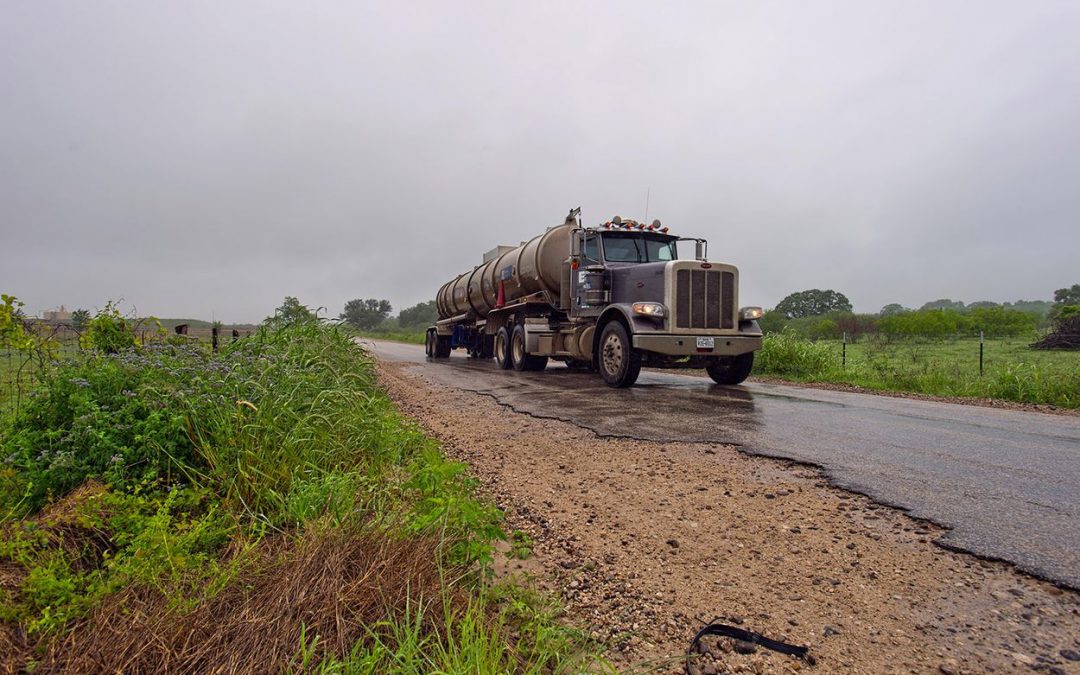 Texas is making billions from oil and gas drilling, but counties say rural roads are being destroyed