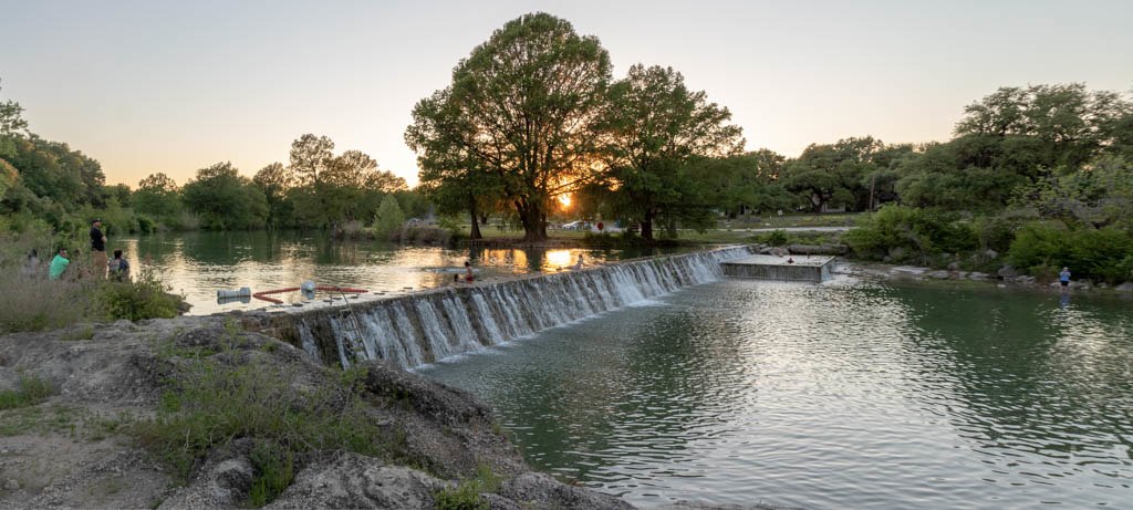 Photo of short river dam at Blanco State Park