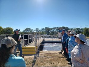 Participants of the grassroots gathering of water advocates on a tour of the Bandera wastewater treatment plant, led by plant manager John Heggemeier (left). Photo courtesy of the Hill Country Alliance.