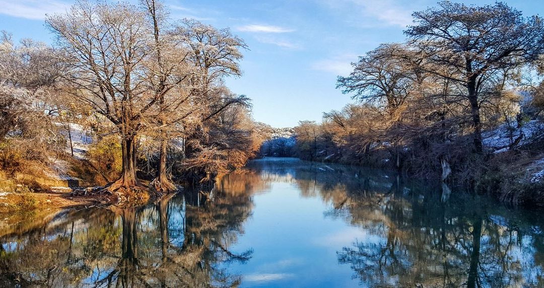 snow on the banks of the guadalupe river
