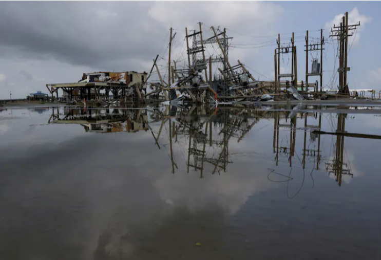 A mass of destroyed building and powerlines after Hurricane Ida flooding