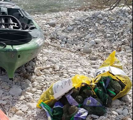 Truck crash spills 42,000 pounds of avocados into South Llano River
