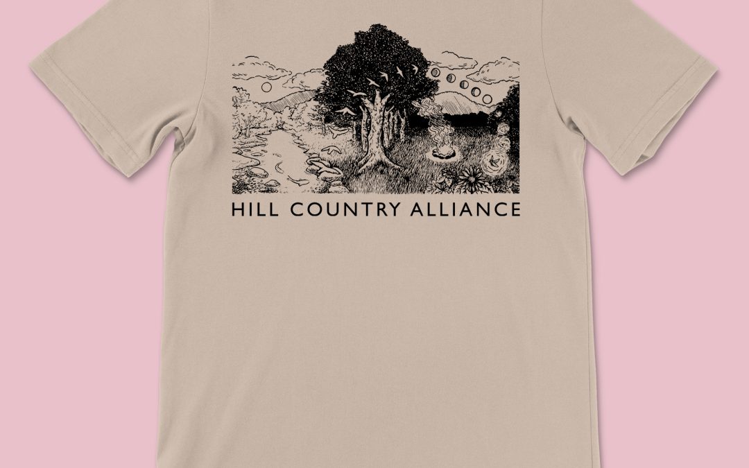 HCA limited edition tan shirt design 2021 - featuring a river, tree, and evening campfire scene