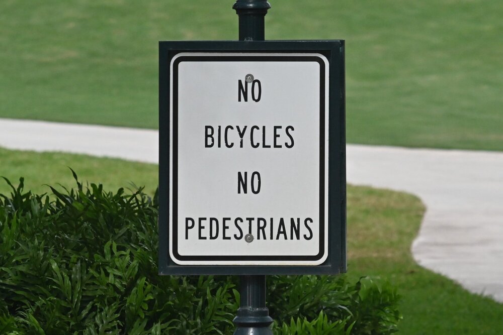 Sign that says "No Bicycles, No Pedestrians"
