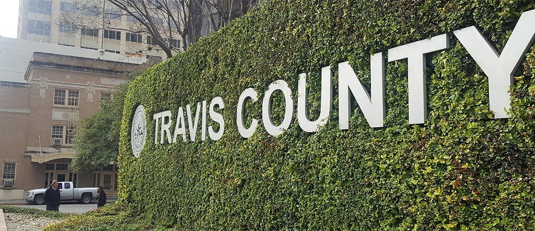 Commissioners debate the creation and funding of a groundwater conservation district in southwest Travis County